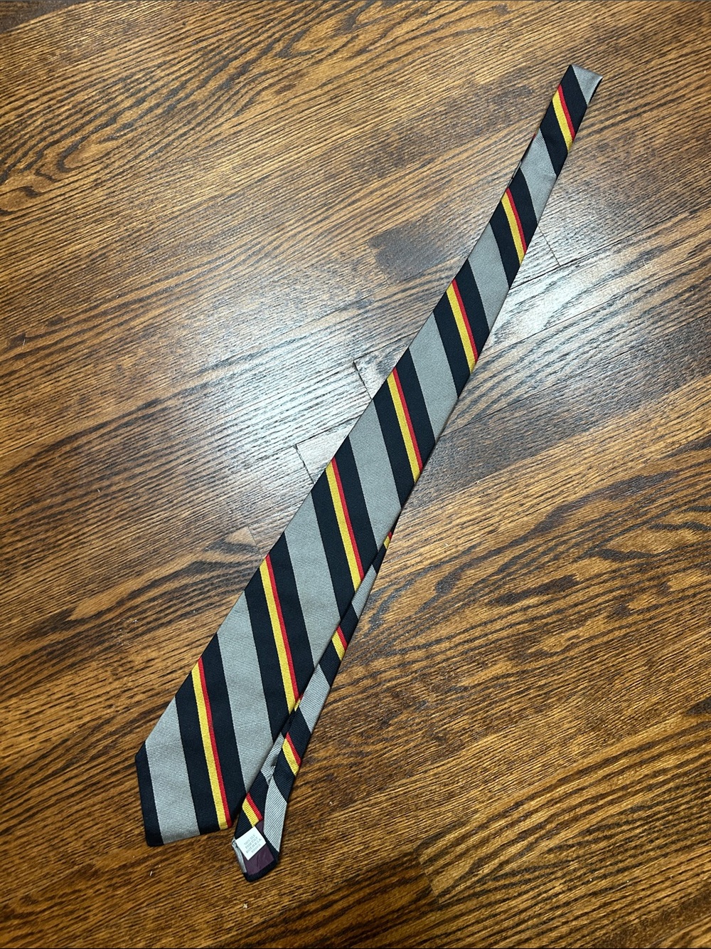Classic Grey Striped Tie with Red and Yellow Accents